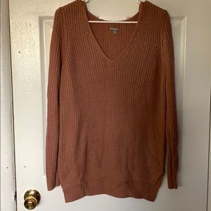 Dark, peachy colored sweater